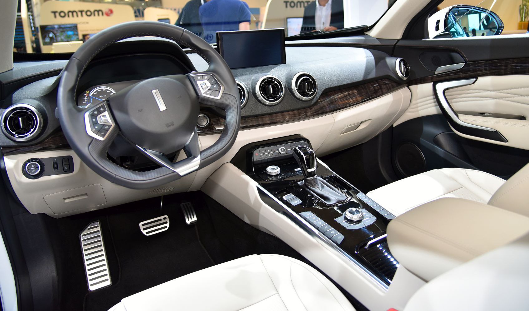 Luxury car interior with advanced dashboard and gear shift