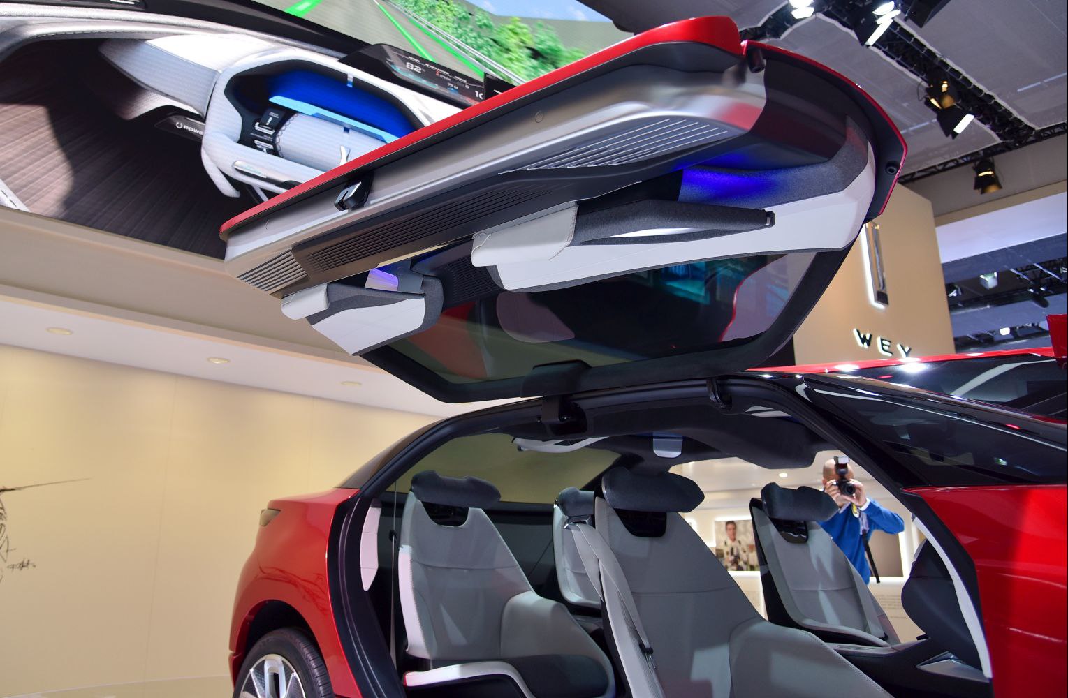 Futuristic gullwing doors with modern electric SUV interior