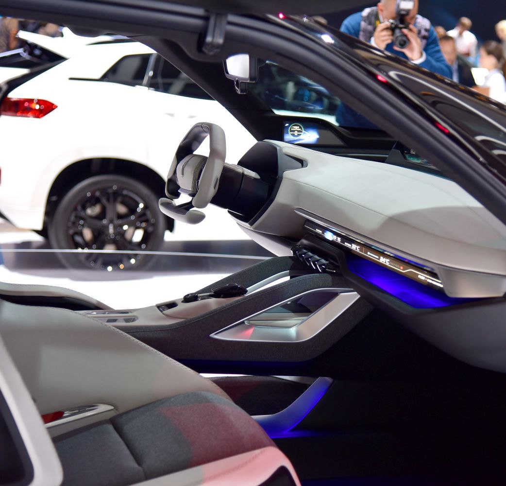 Futuristic dashboard with yoke steering and ambient lighting