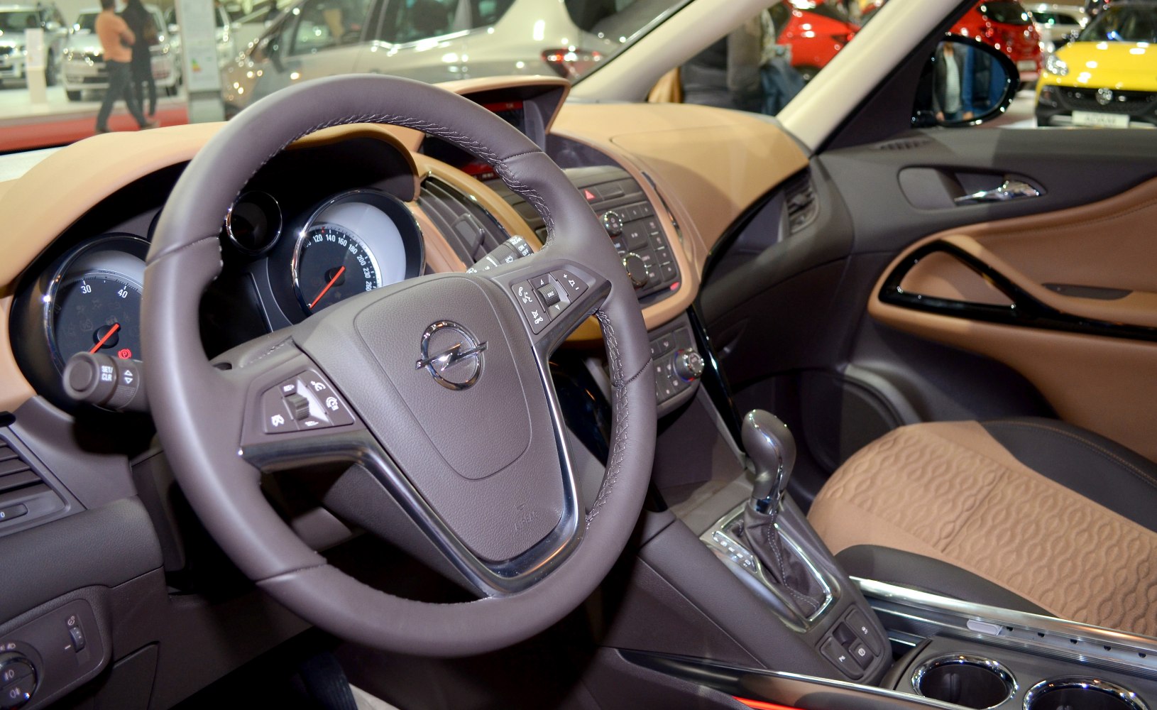 Dashboard, steering wheel, and gear shift in a modern car interior
