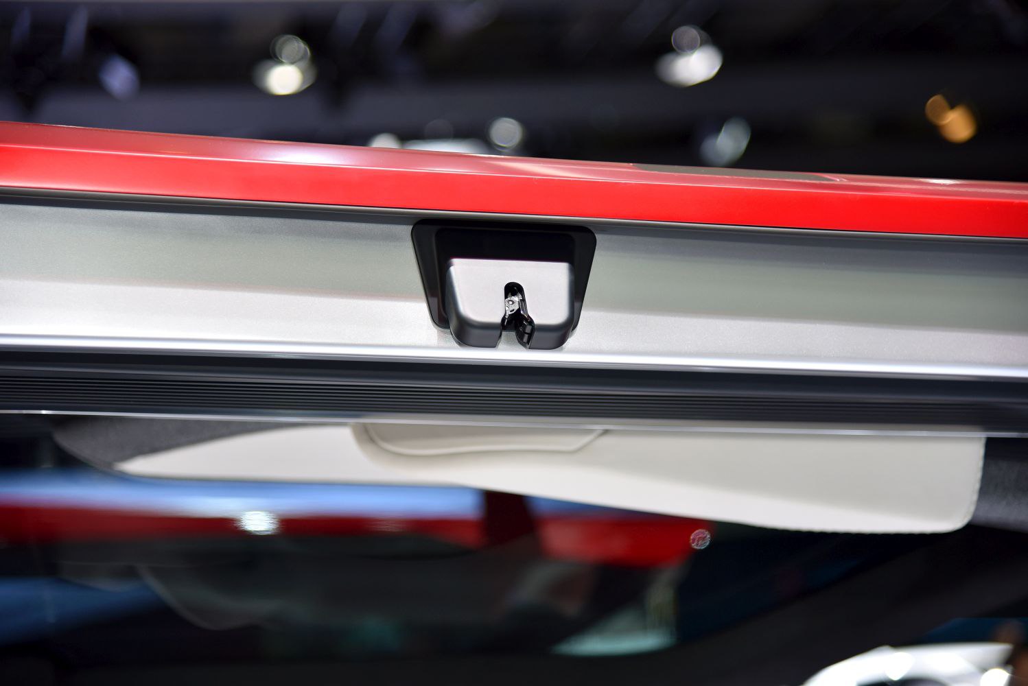 Close-up of rear hatch lock latch mechanism.