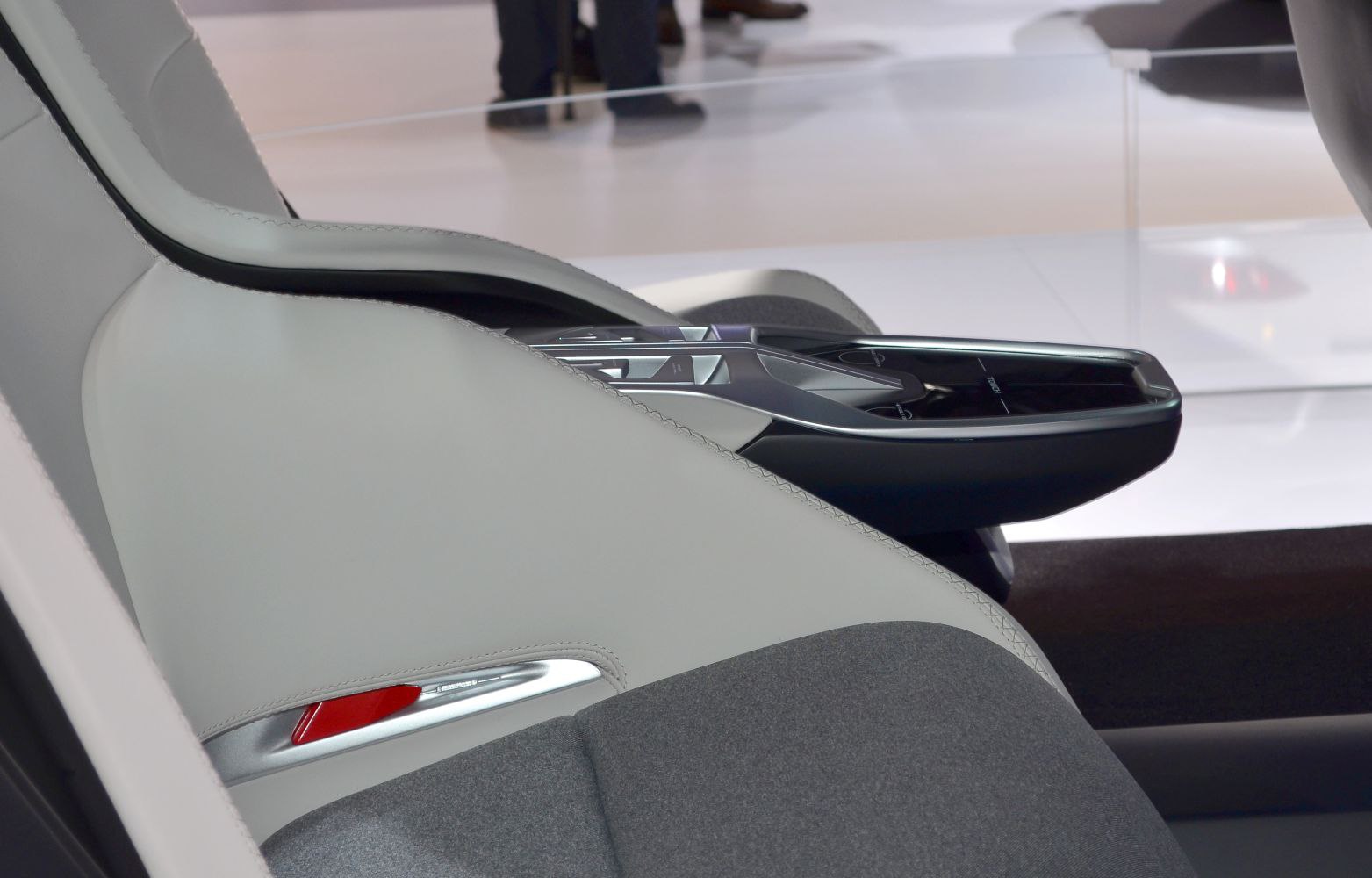 Sleek futuristic armrest with integrated control panel