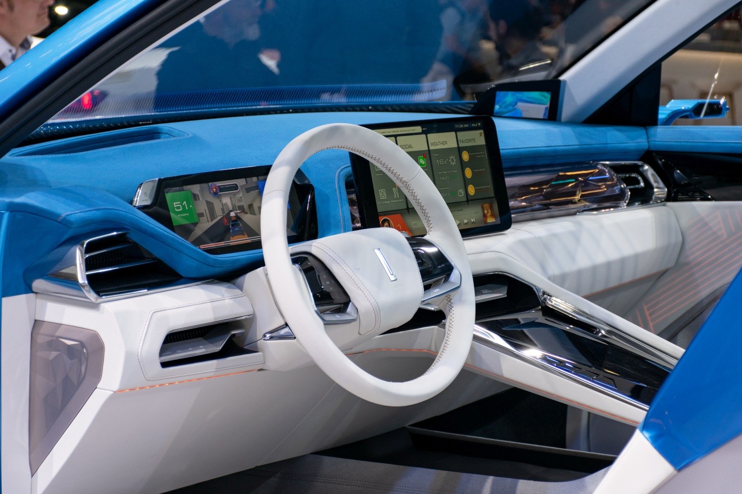 Digital dashboard and white leather steering wheel