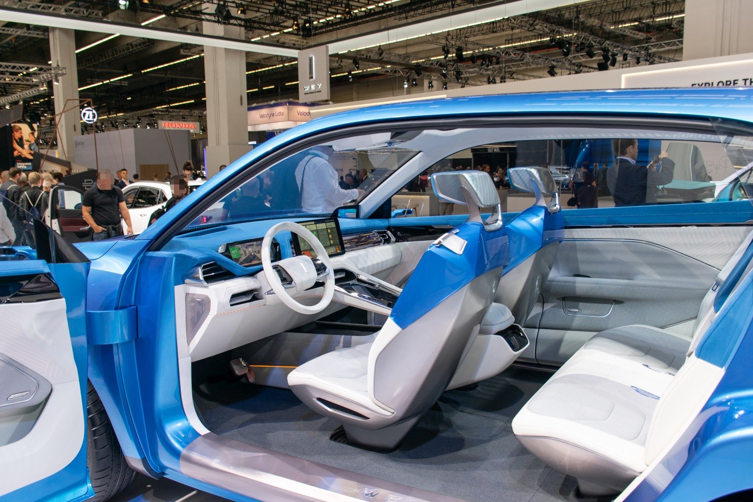 Futuristic car interior with digital dashboard and minimalist design.
