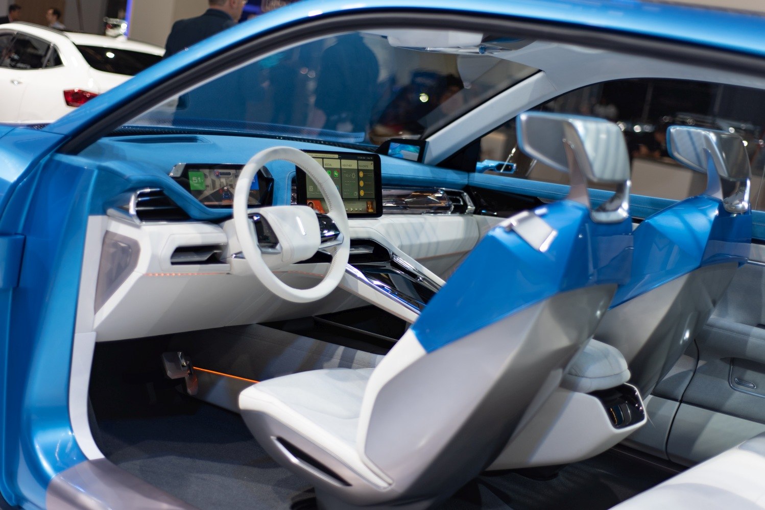 Futuristic interior with dual digital displays and modern ergonomic design