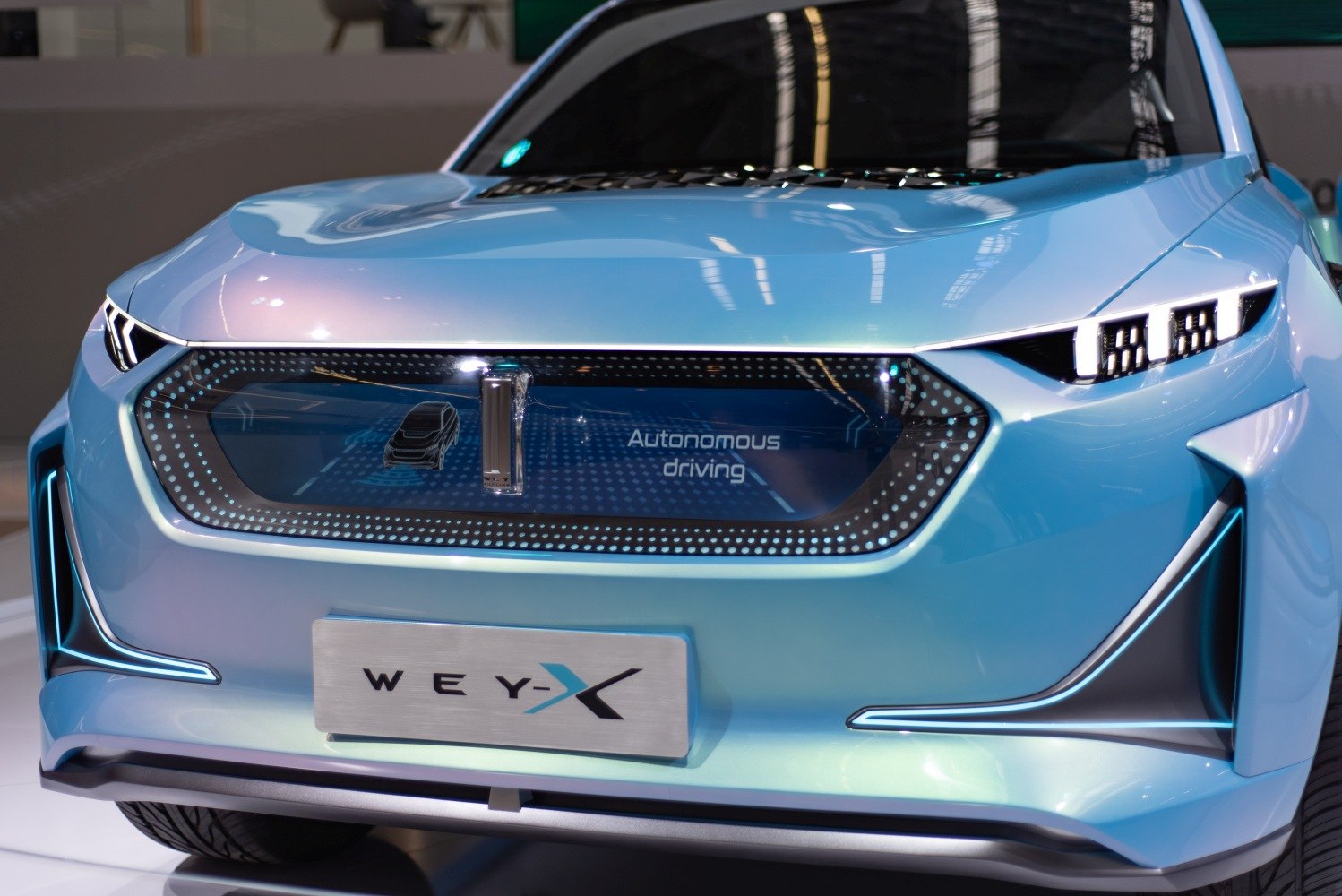 Futuristic front grille with LED headlights and autonomous driving display