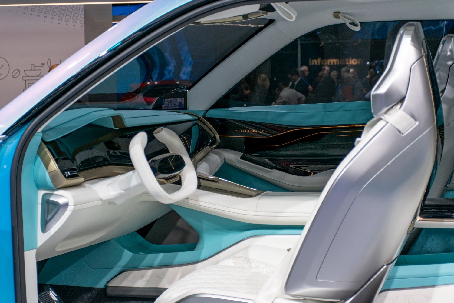 Futuristic interior with minimalist dashboard and unique steering wheel