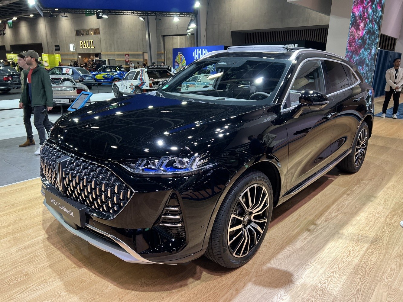Bold front grille and modern LED headlights on sleek black SUV