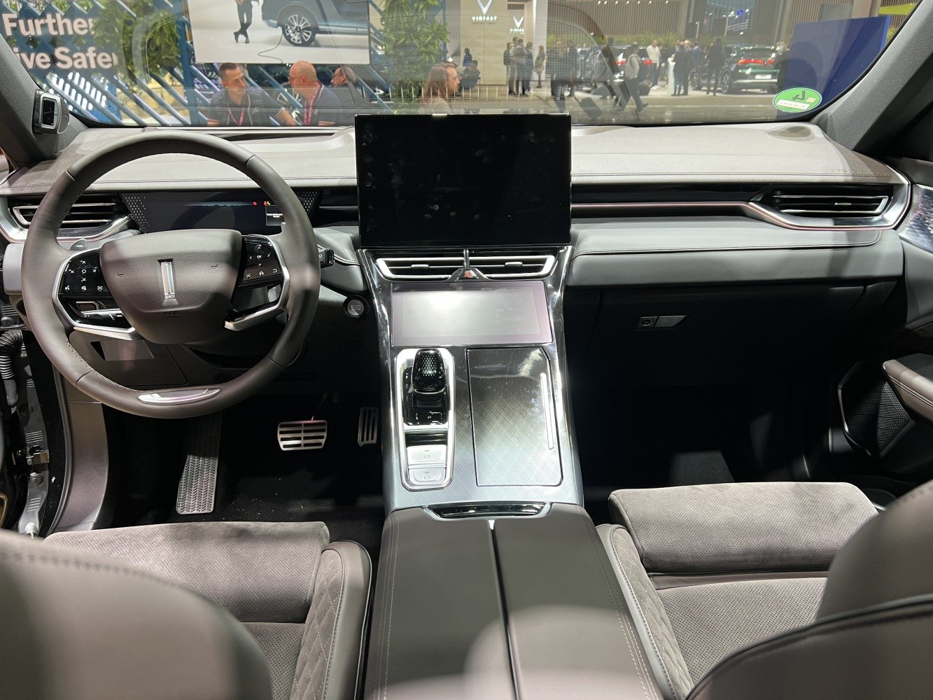 Digital dashboard with dual touchscreens and ergonomic center console controls