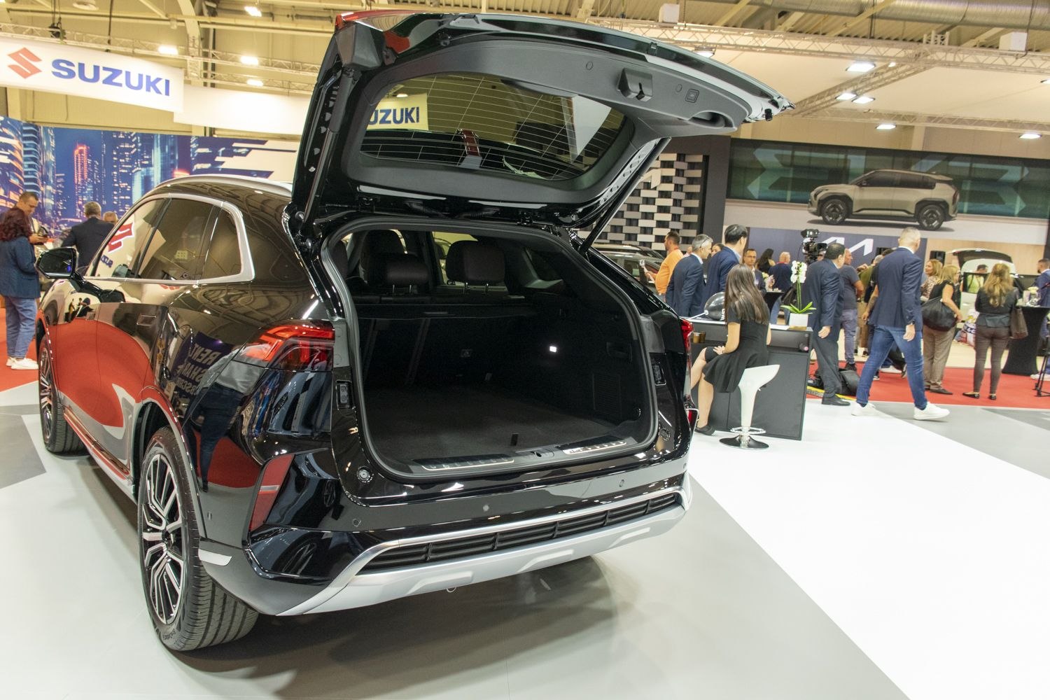 Open rear trunk with large cargo space and sleek SUV rear design