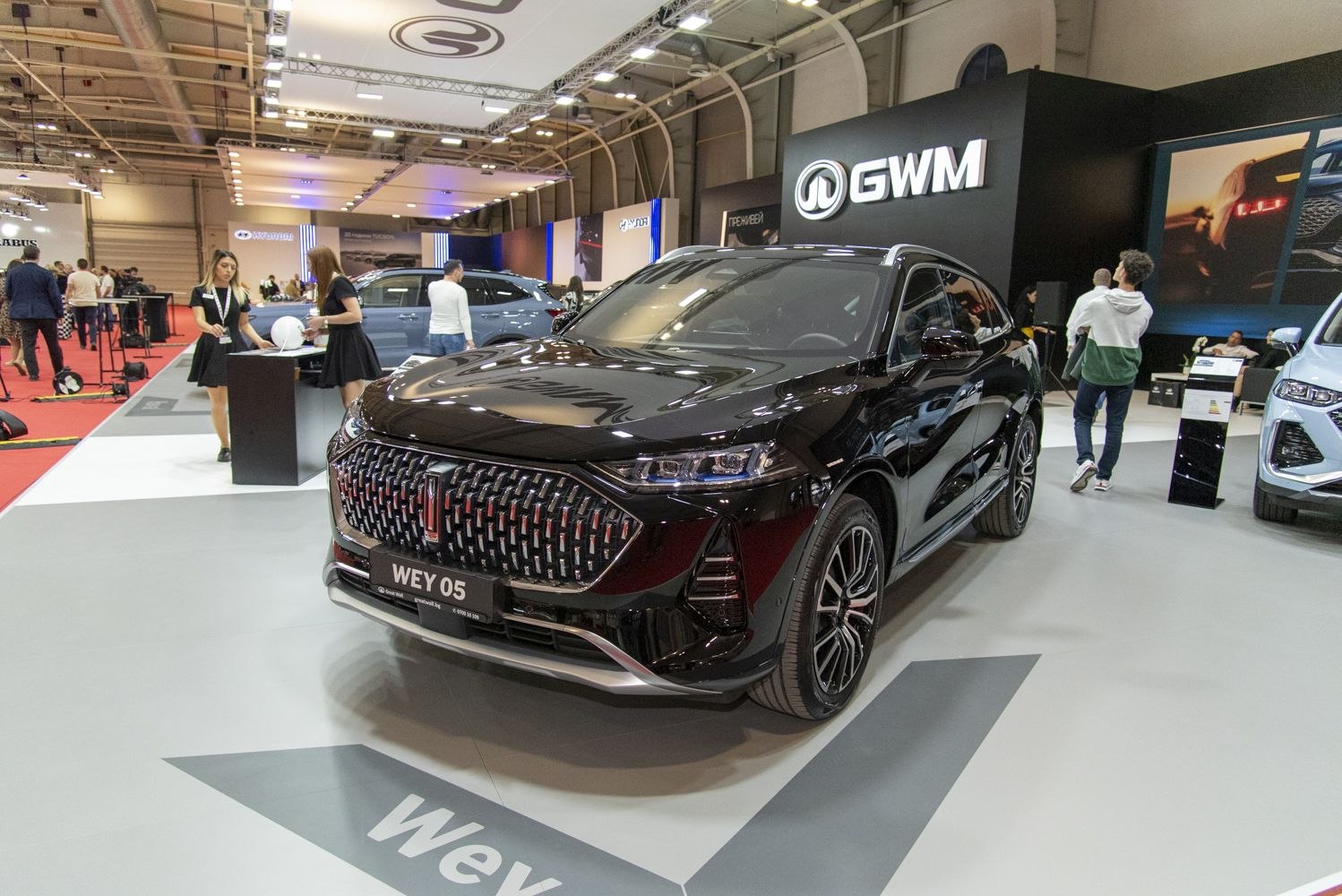 Black SUV with geometric mesh grille and sharp LED headlights