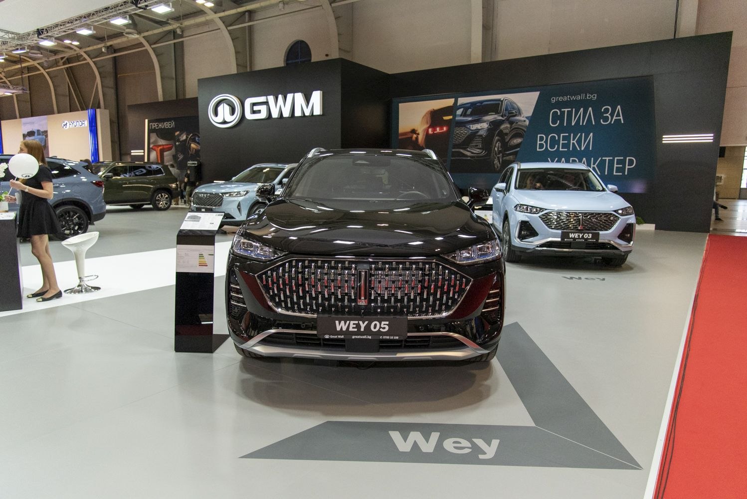 Modern SUV front with large grille and LED headlights