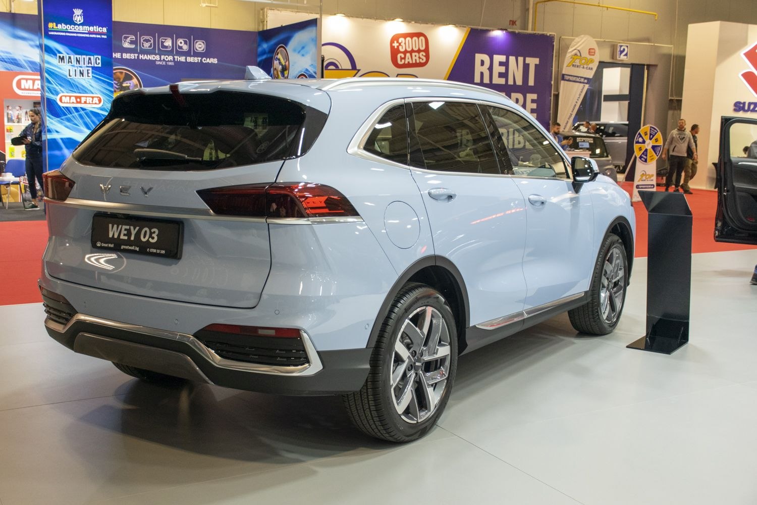 Rear and side view of modern SUV with tinted windows and alloy wheels