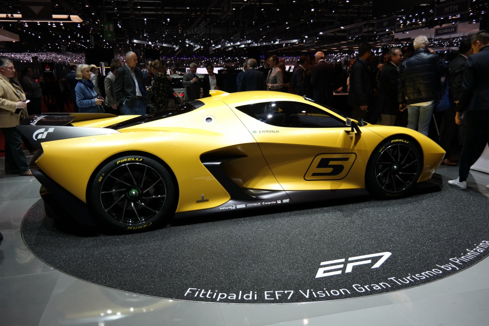 Yellow racing supercar with aerodynamic shape and number 5