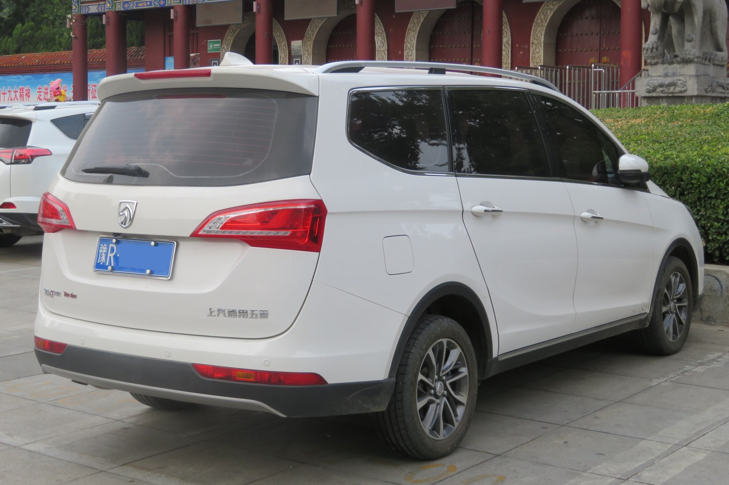 Rear view of family SUV with modern taillights and tinted windows