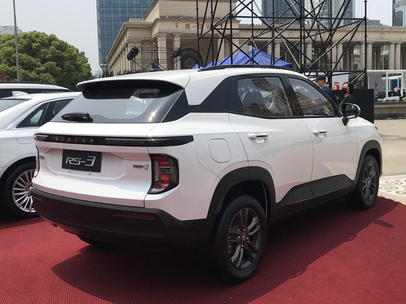White SUV rear with sleek LED taillights and rear windshield wiper