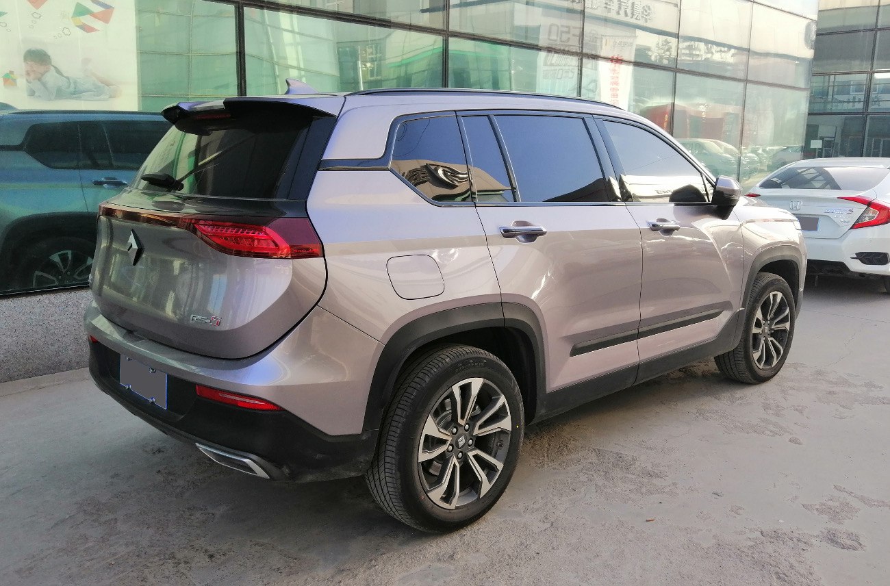SUV rear and side view with alloy wheels and tinted windows