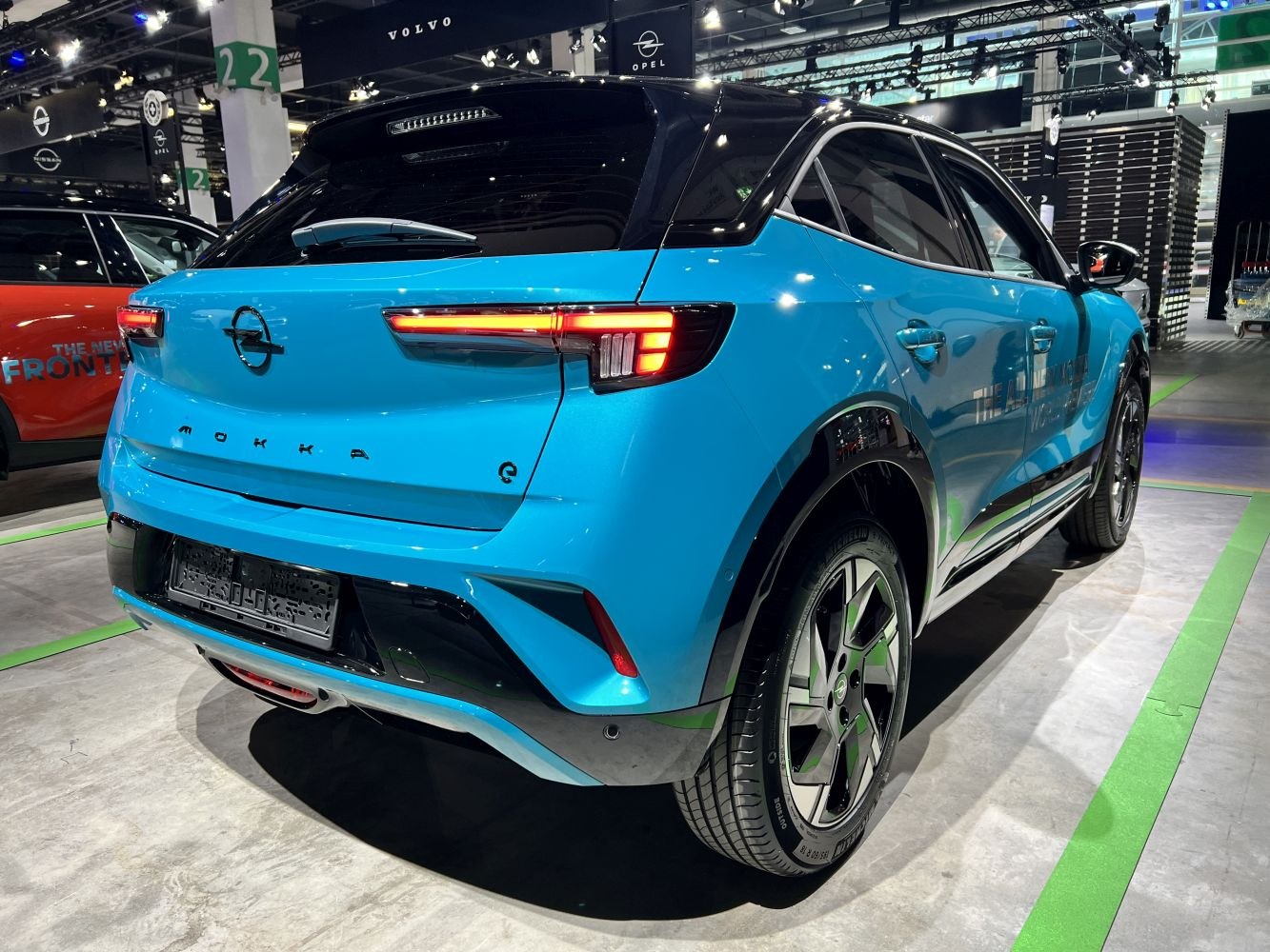 Rear view with LED tail lights and two-tone blue-black paint