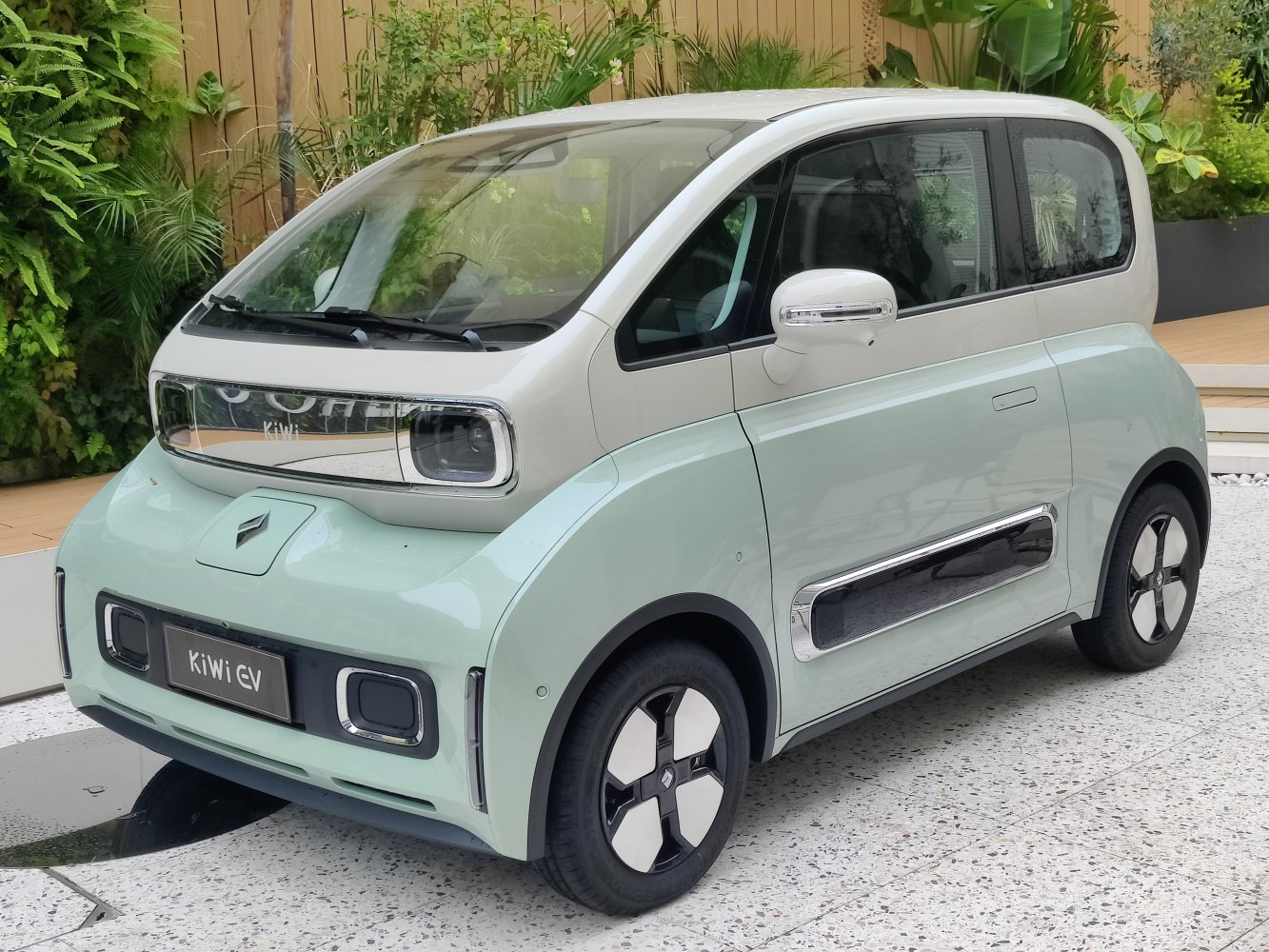 Compact electric hatchback with futuristic dual-tone design and unique front fascia
