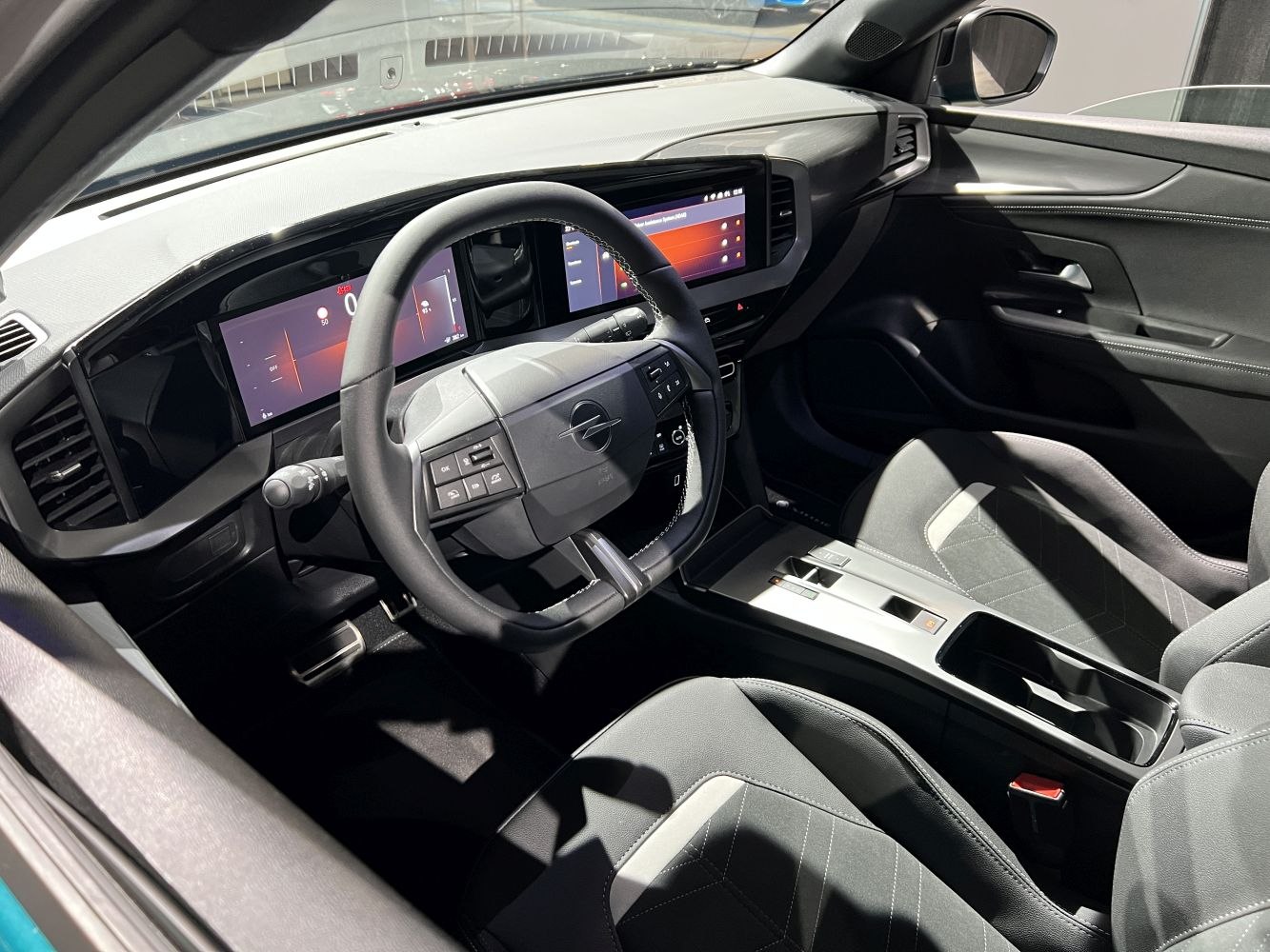 Digital dashboard and multifunction steering wheel with modern car interior design