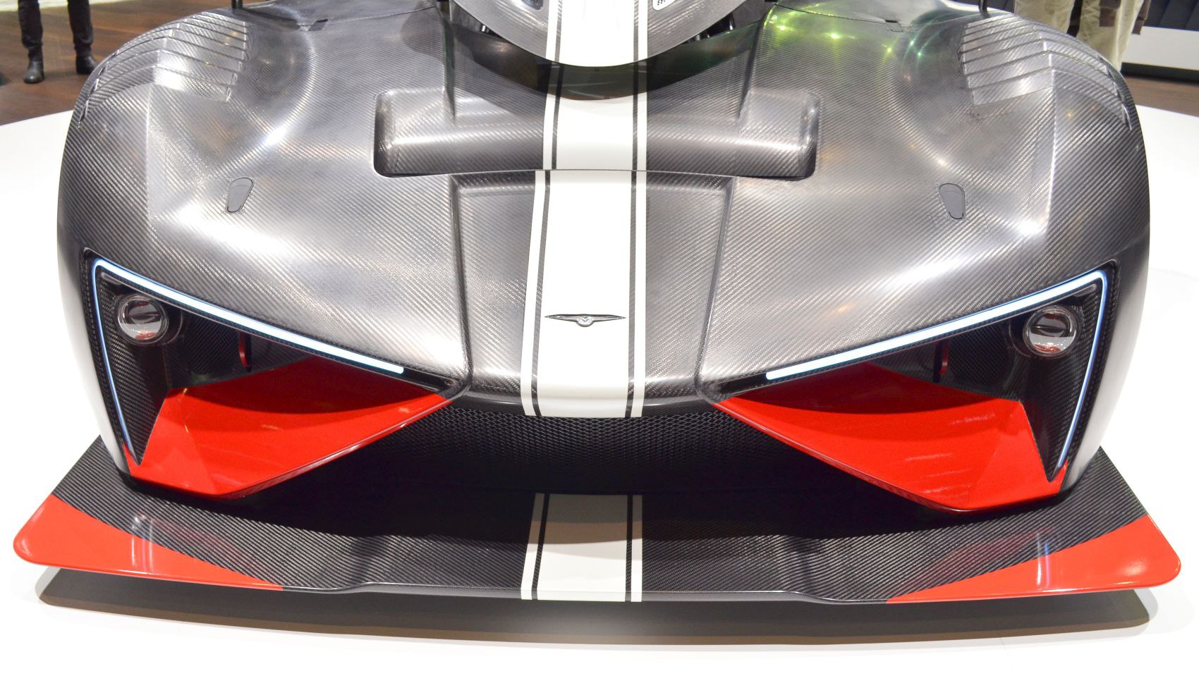 Front view with carbon fiber body and red aerodynamic accents