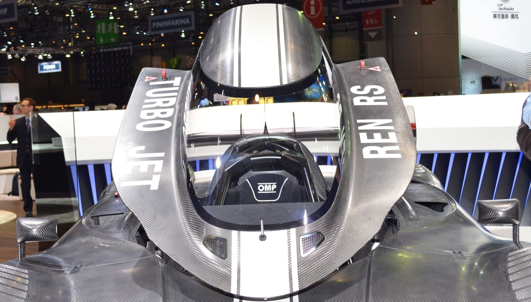 Turbo jet branded aerodynamic carbon fiber cockpit design with racing seat