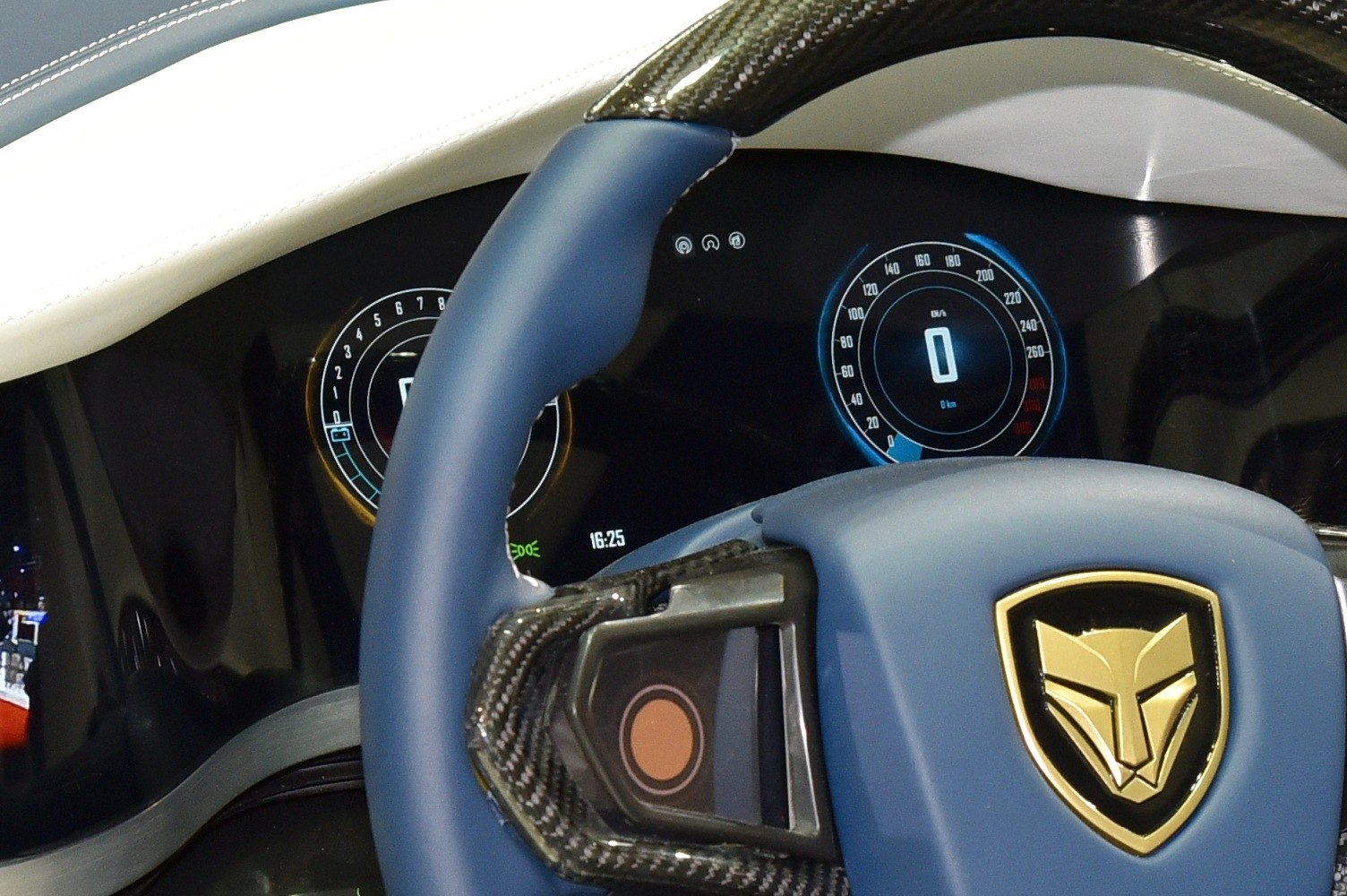 Digital instrument cluster and premium steering wheel with carbon fiber trim