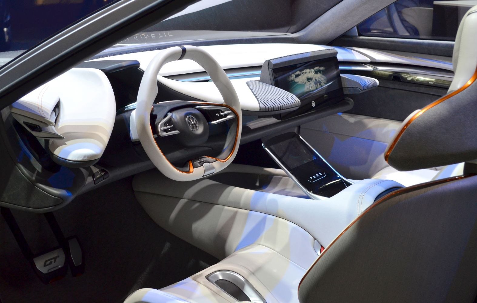 Digital dashboard, unique steering wheel, and touchscreen center console