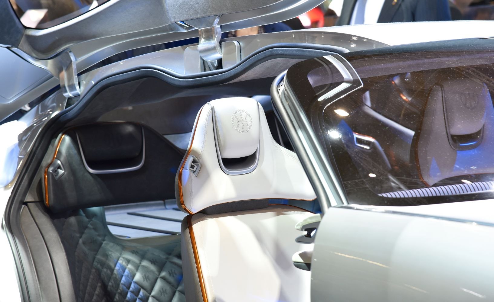 White leather luxury car seat with spacious, modern interior design