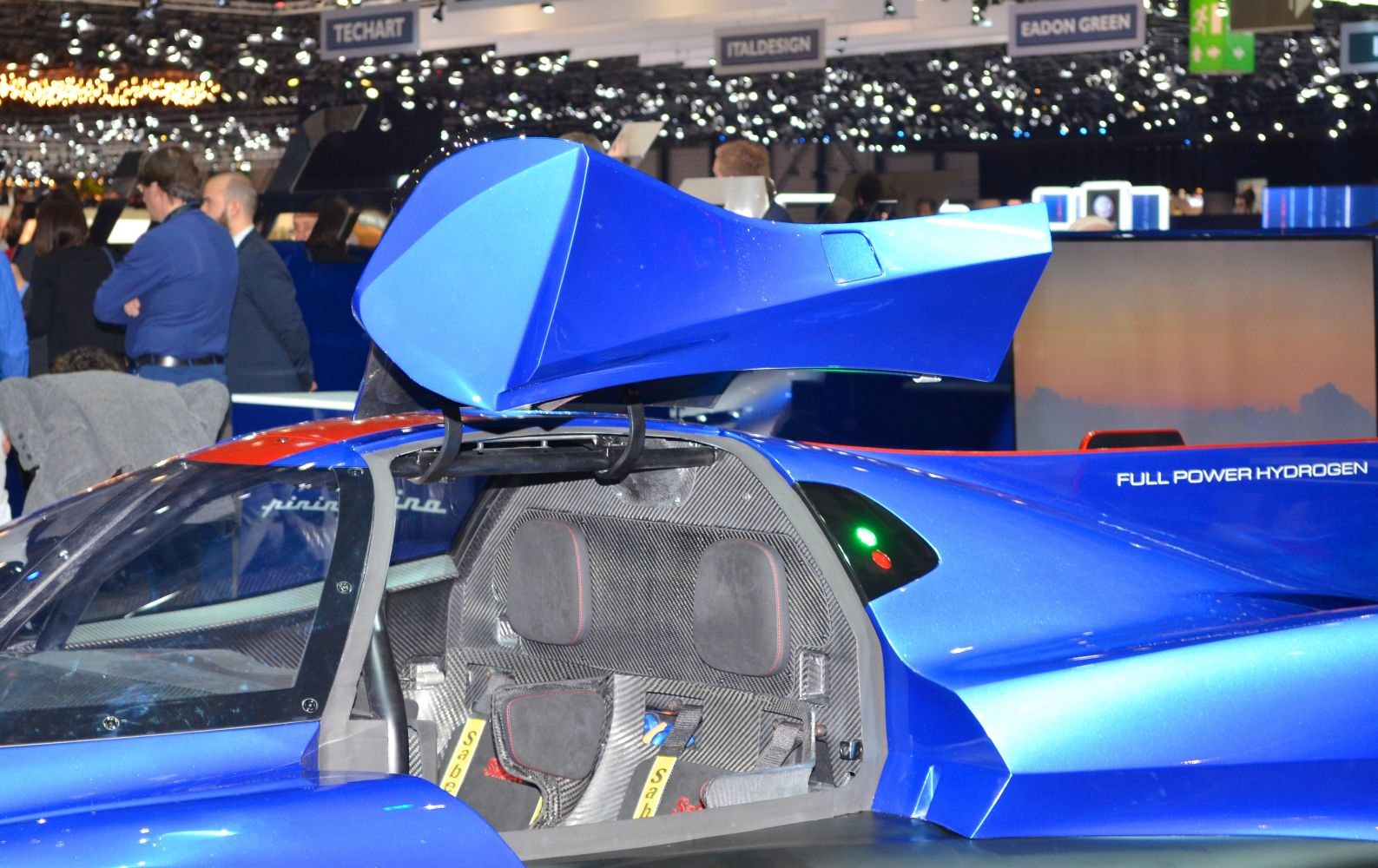 Gullwing door open with carbon fiber interior and racing seats
