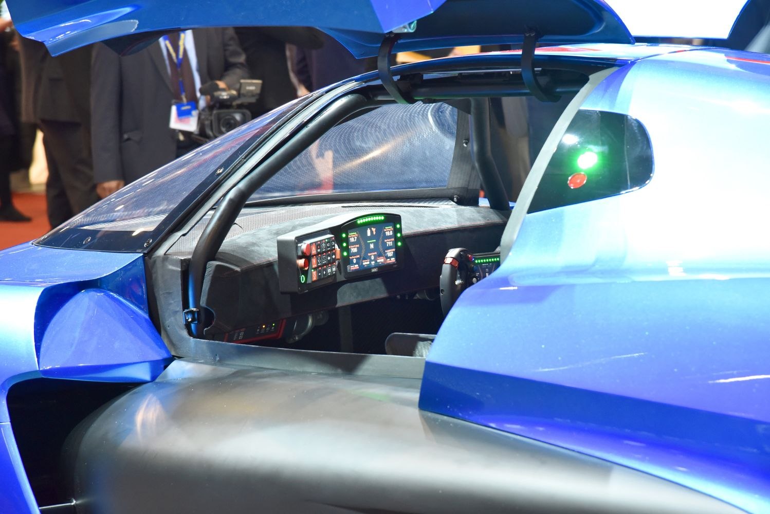Racing cockpit with digital dashboard and advanced control panel