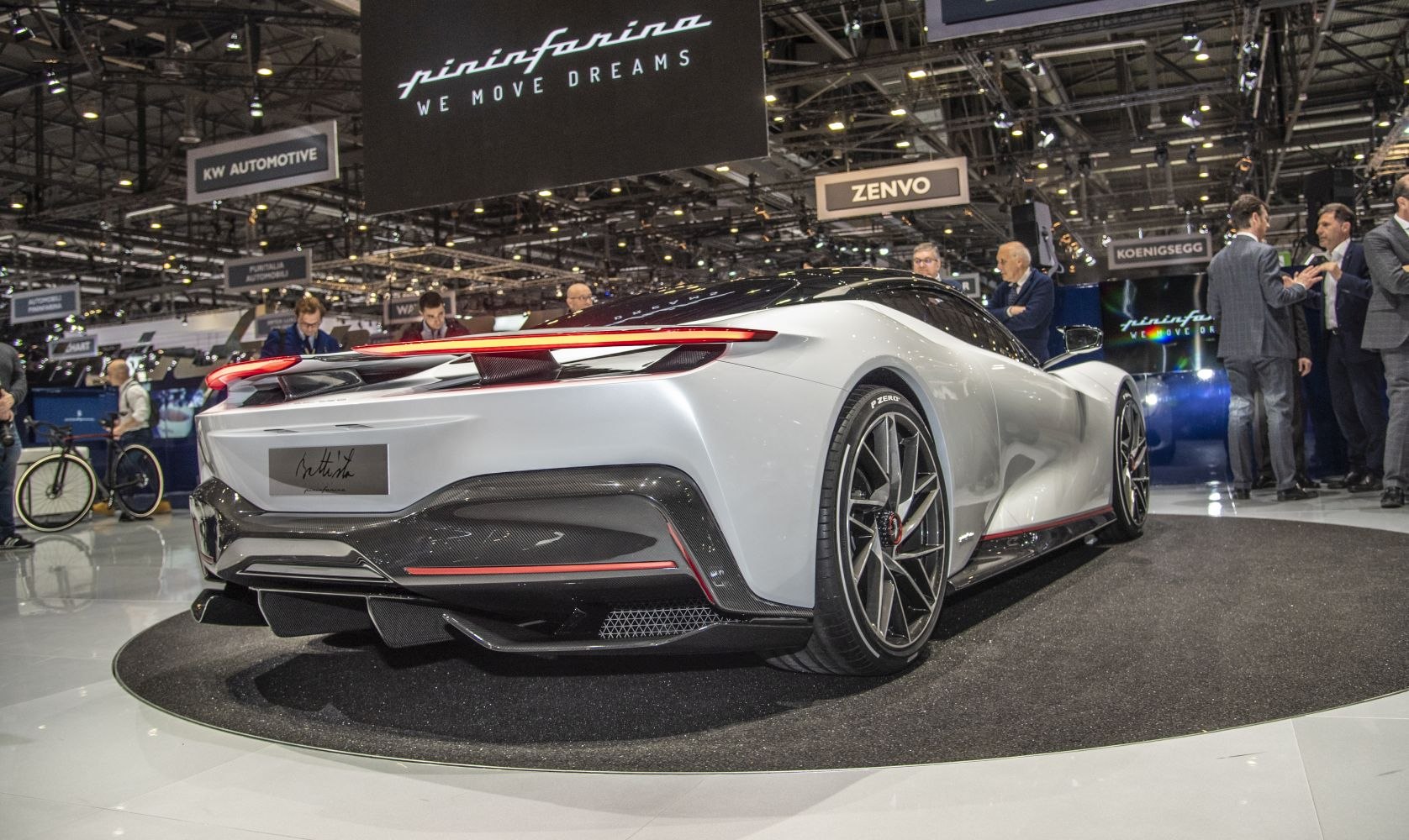Rear view with sleek aerodynamic design and sporty wheels