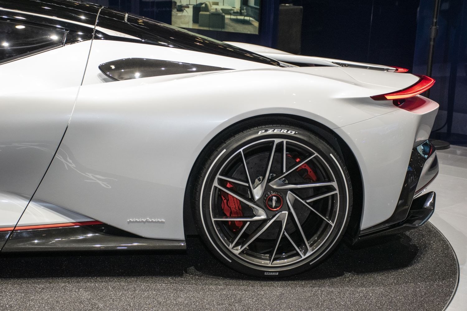 Rear wheel with alloy rim and aerodynamic side body panel