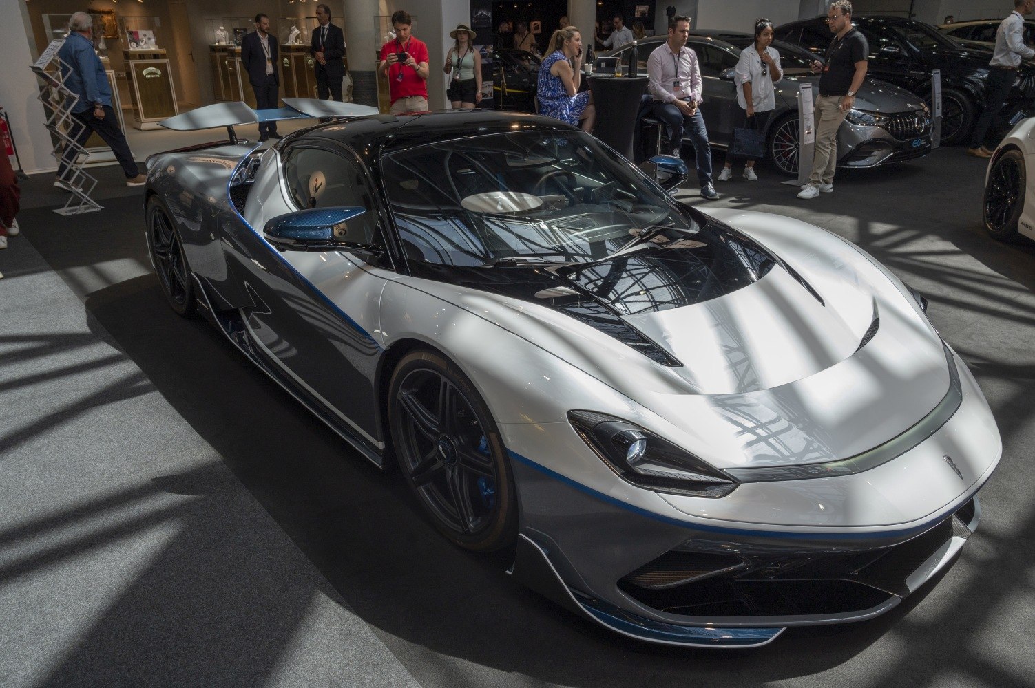 Sleek aerodynamic hypercar with large rear wing and glossy finish