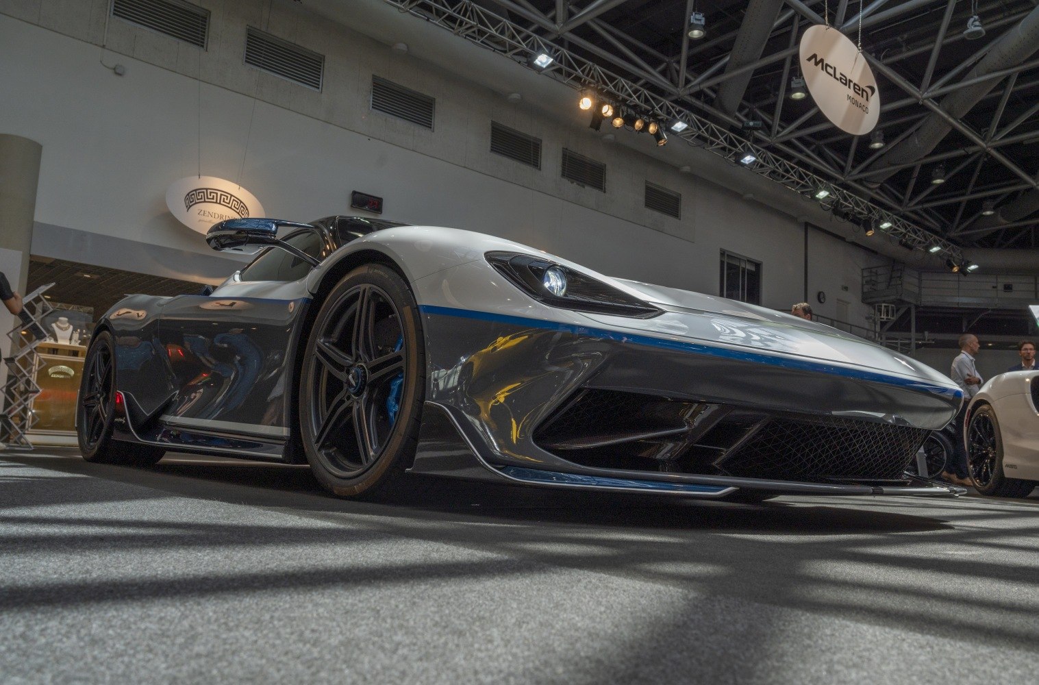 Aerodynamic front bumper with sharp headlights and sporty wheels