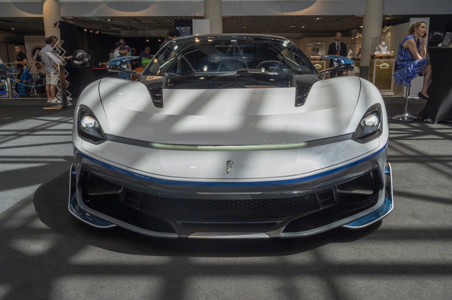 Front view showcasing aggressive aero design and sleek headlights