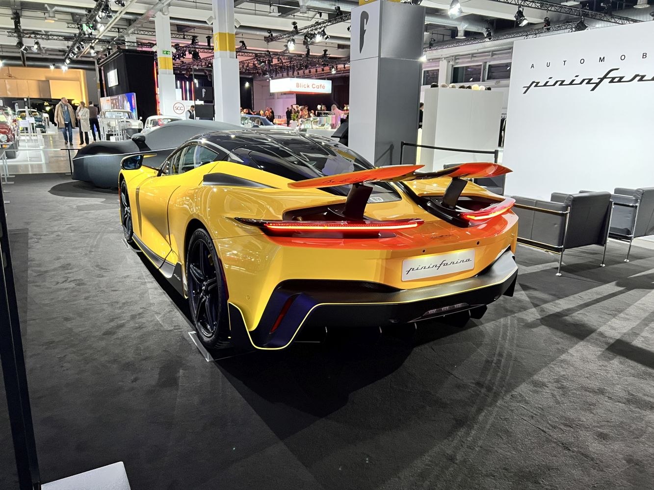 Hypercar rear view with dual active rear wings and distinctive rear lights