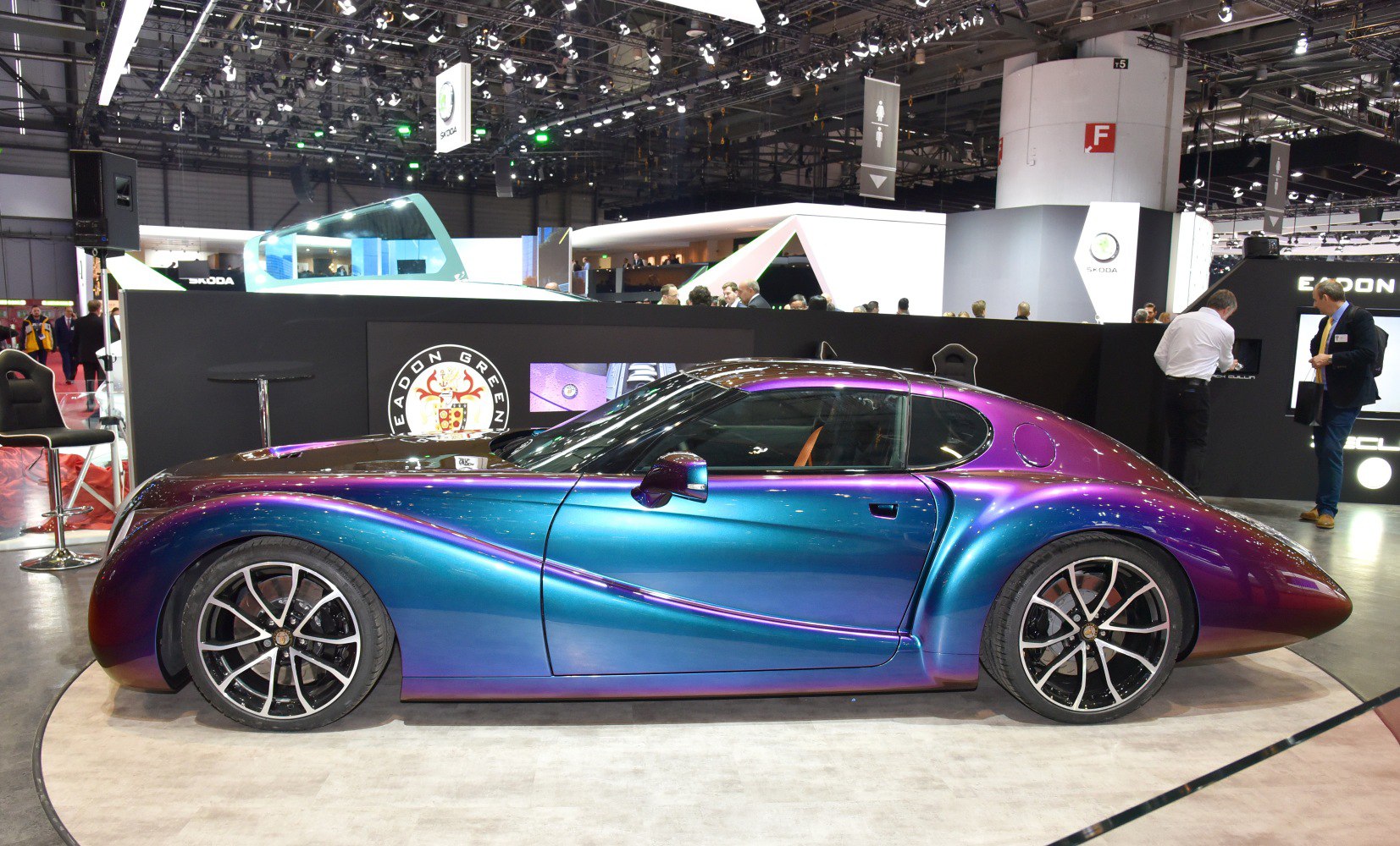 Two-tone metallic paint with sleek aerodynamic coupe body.