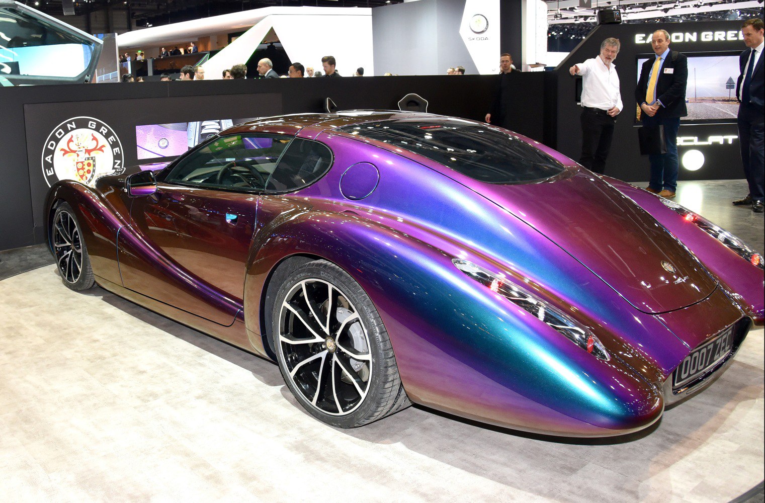 Iridescent paint finish and sleek, flowing rear design with custom wheels