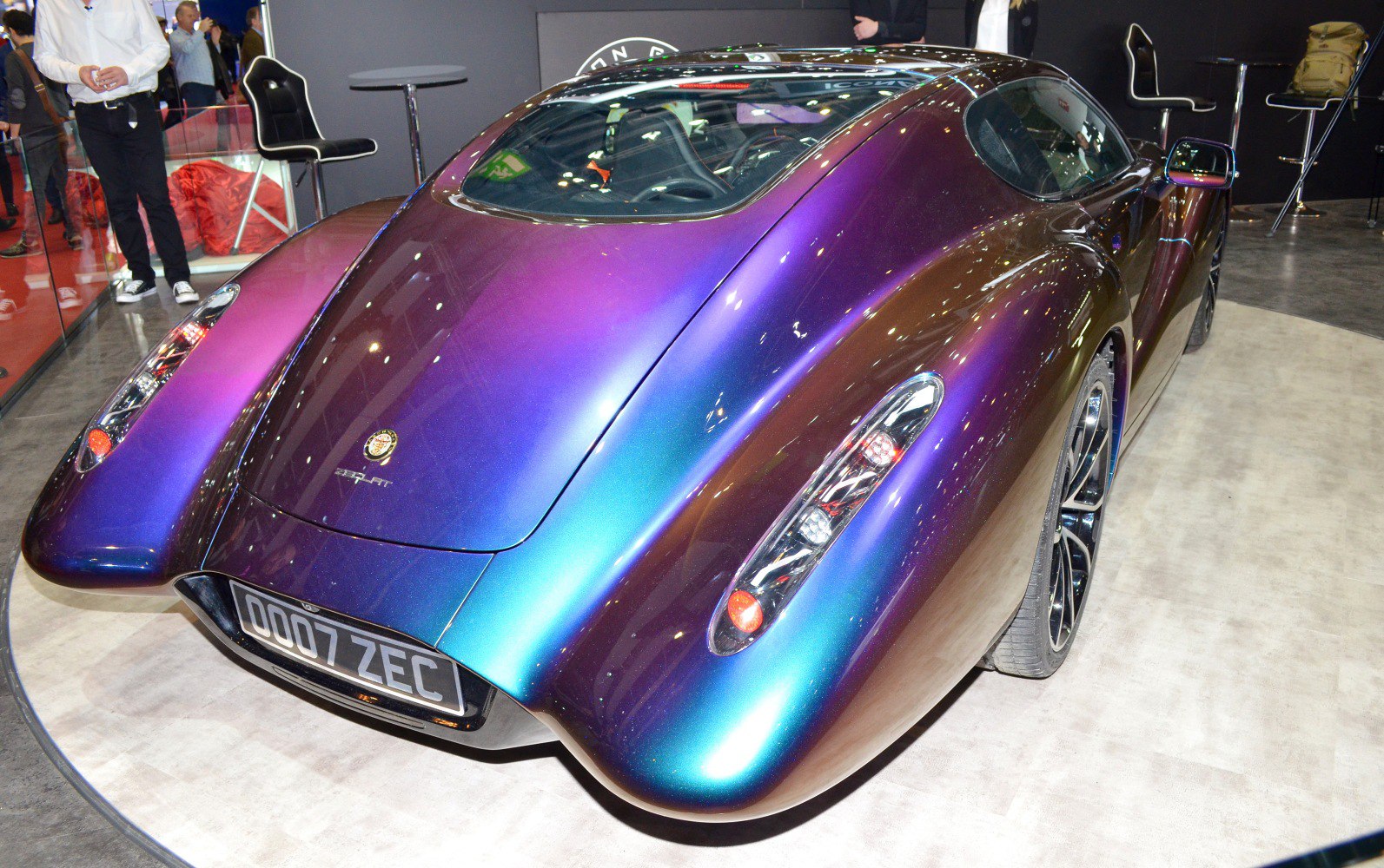 Futuristic aerodynamic rear design with unique multi-color paint and sleek tail lights