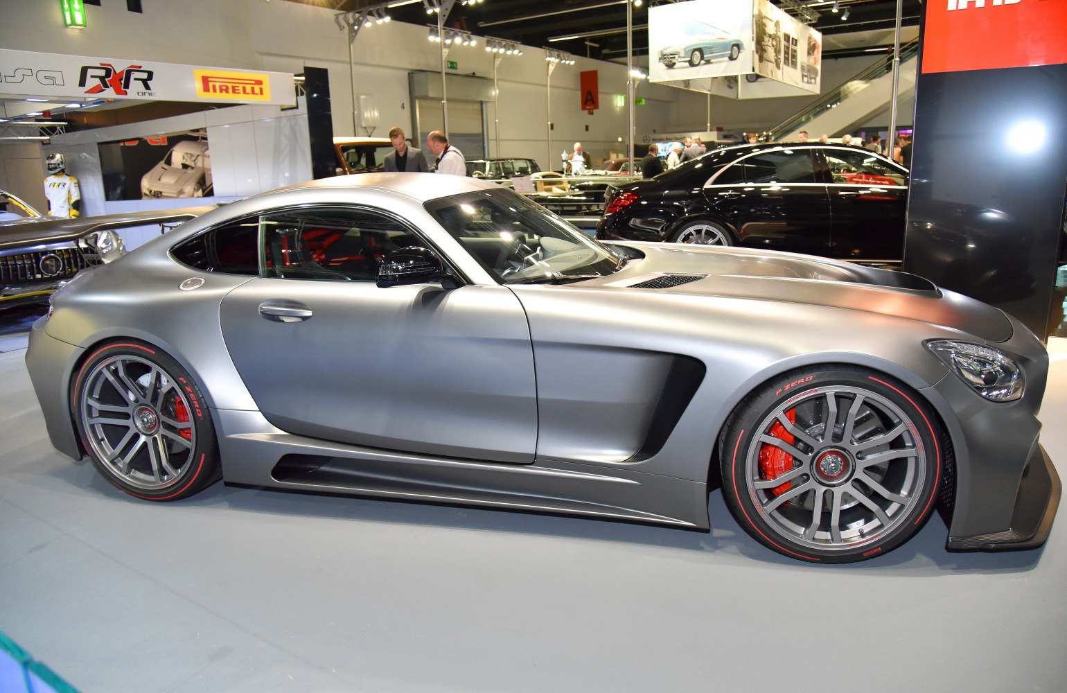 Silver sports coupe with aerodynamic vents and red-accented brake calipers