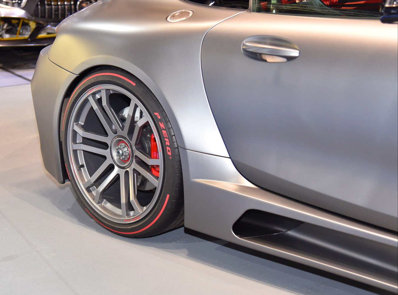 Close-up of alloy wheel with Pirelli P Zero tire and side vent