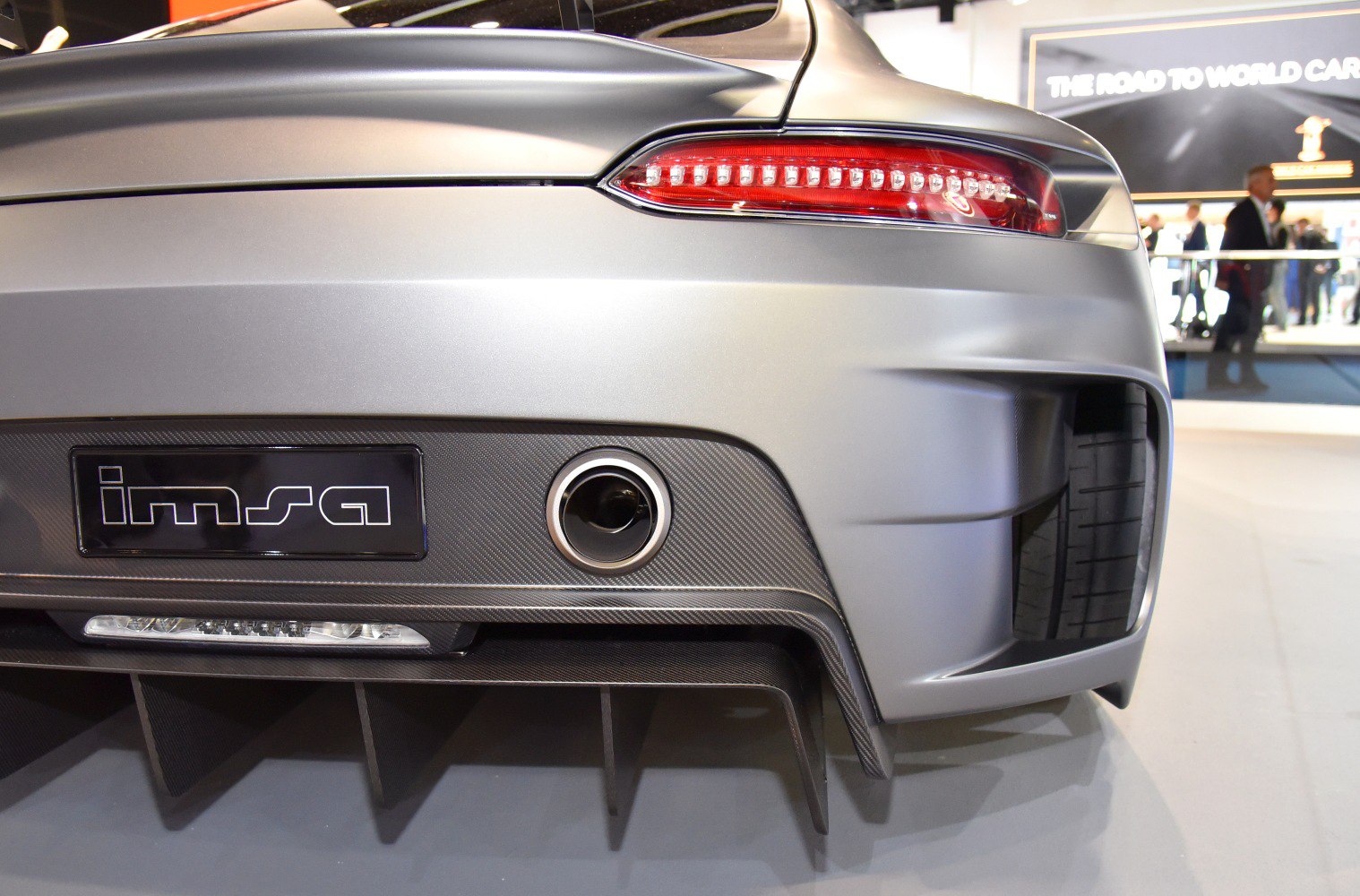 Rear diffuser, exhaust pipe, and LED taillight close-up