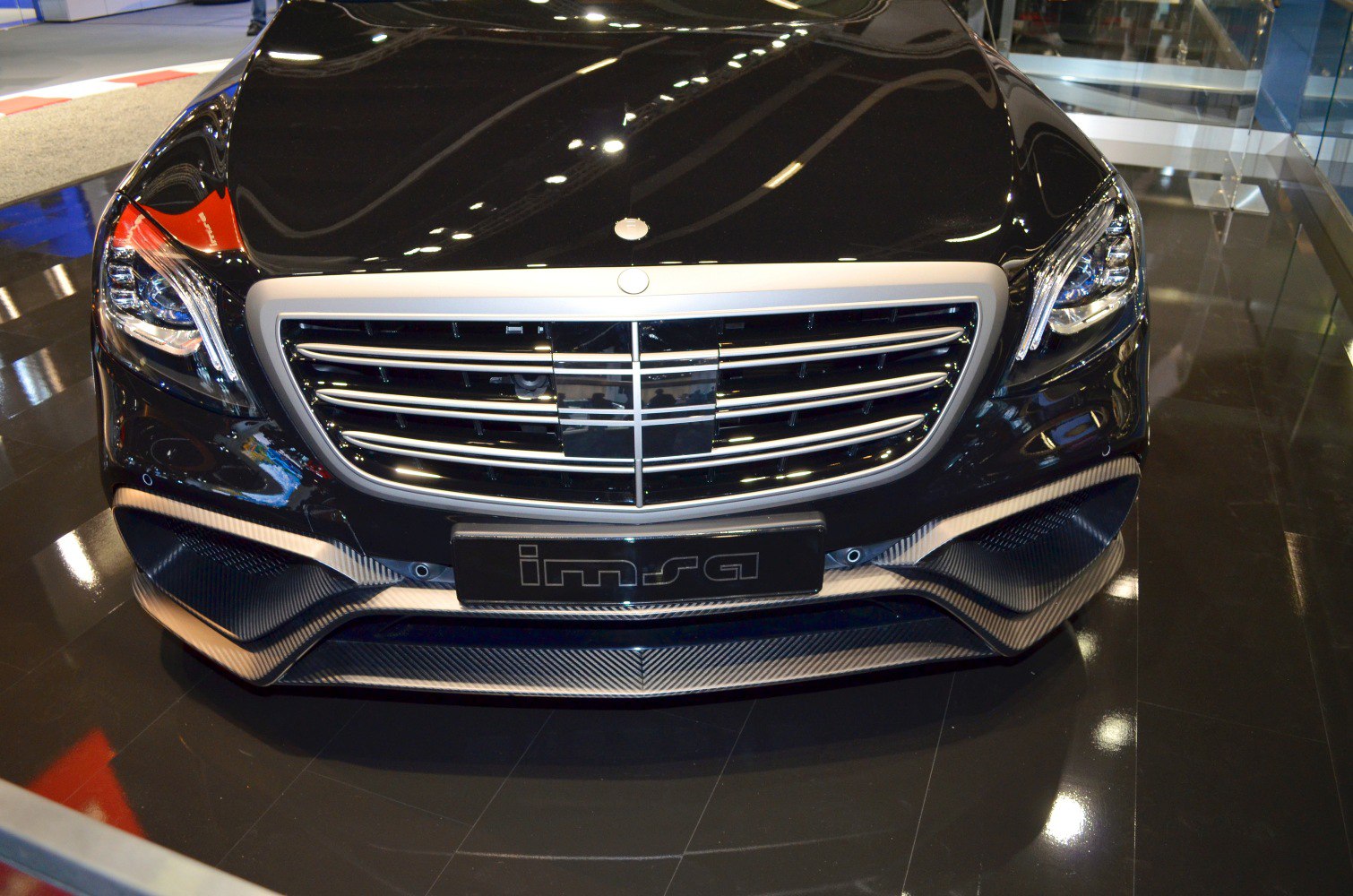 Front grille and headlights with carbon fiber splitter
