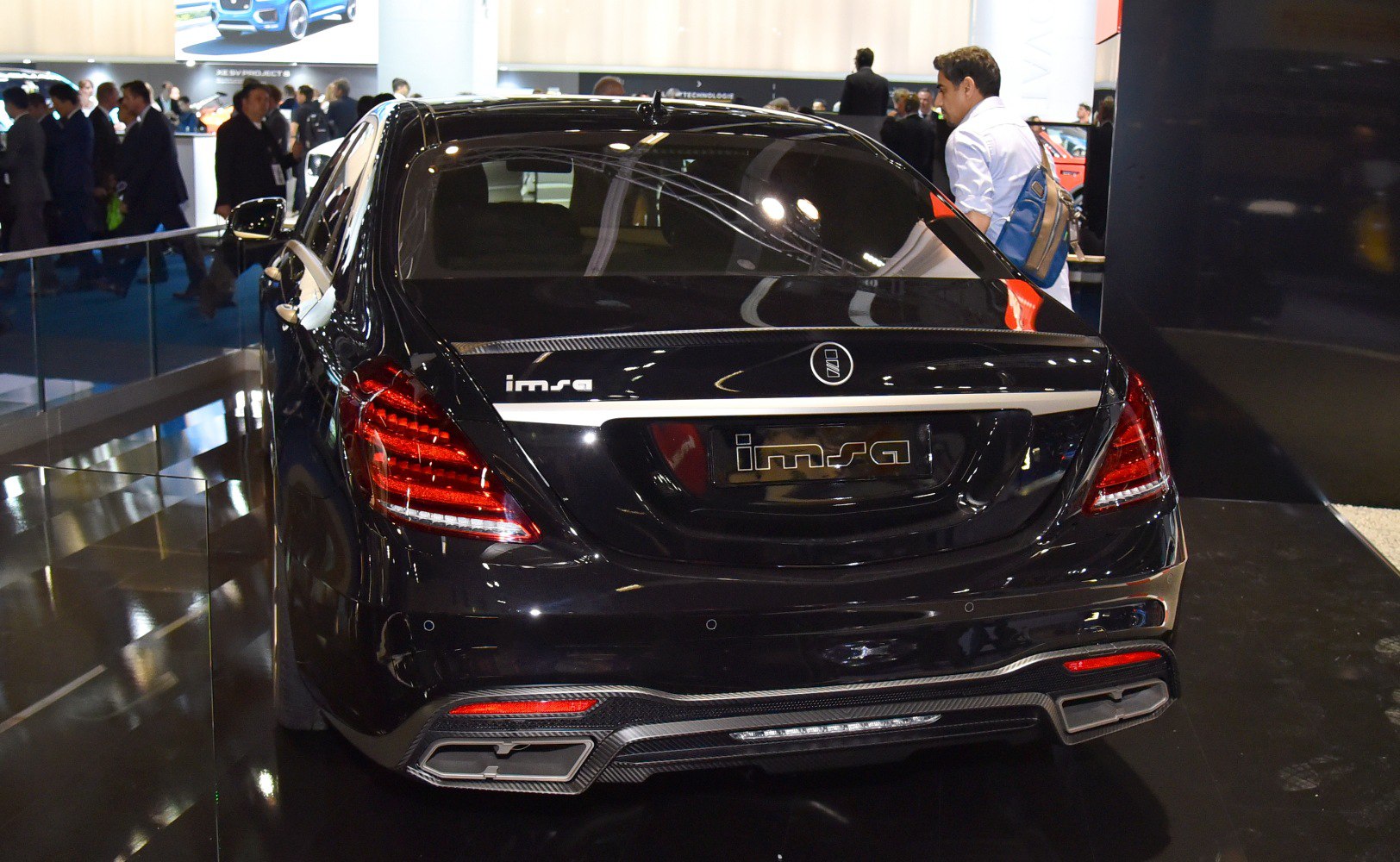 Rear view with LED taillights and dual exhausts in glossy black