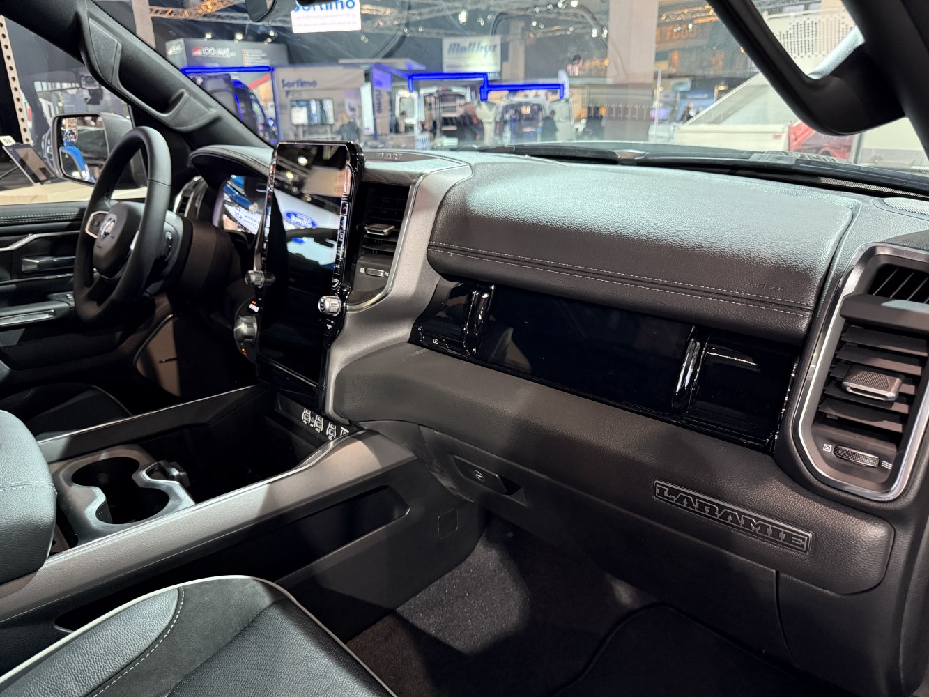 Modern truck interior with vertical touchscreen and detailed dashboard
