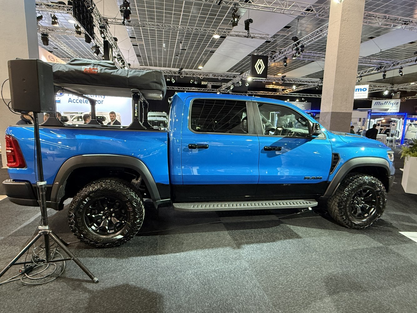 Side profile of pickup with off-road tires and crew cab configuration