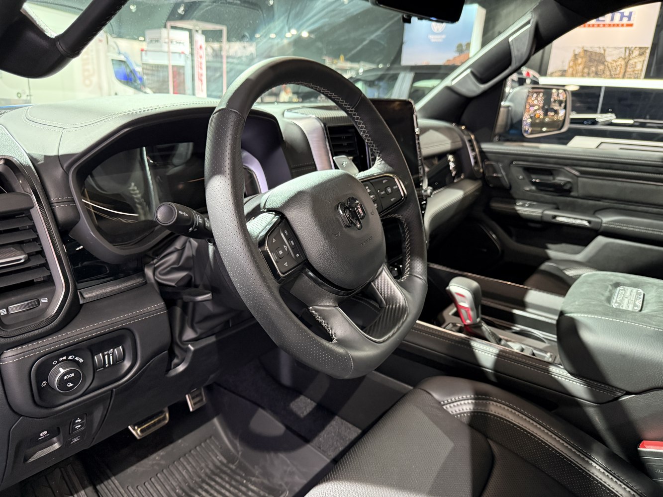 Steering wheel with controls and instrument cluster dashboard
