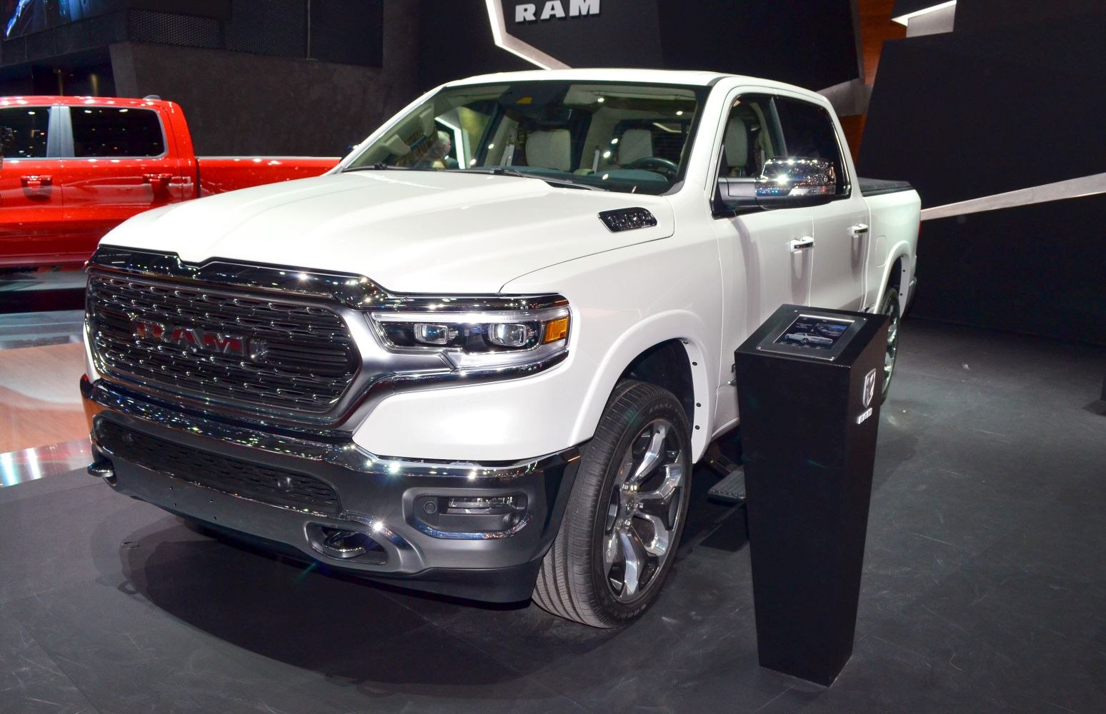 Front and side view of pickup truck with LED headlights and chrome accents