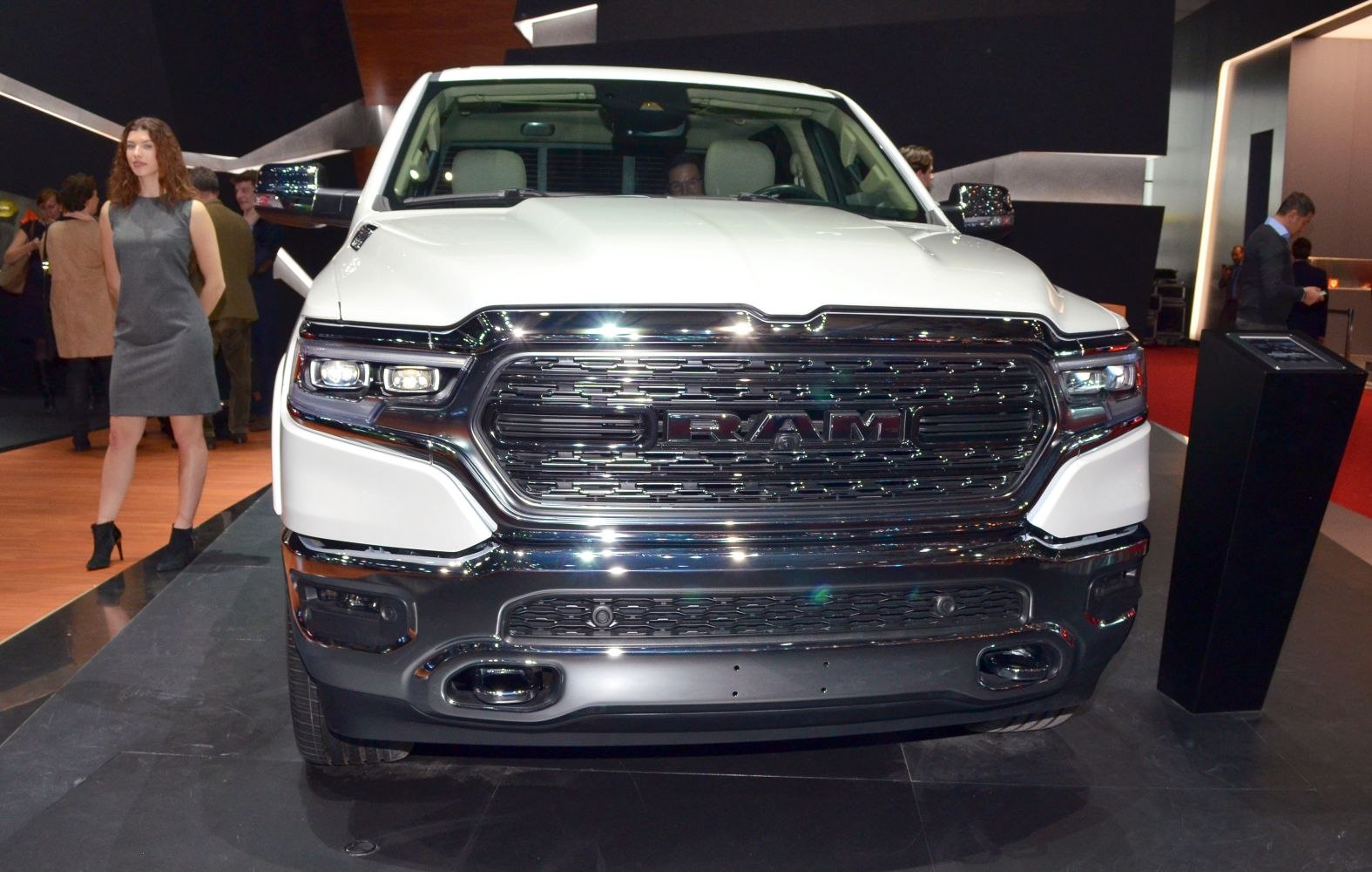 Close-up of RAM 1500 front grille and LED headlights